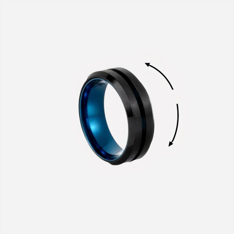 Bague bleue et noire sur fond blanc.