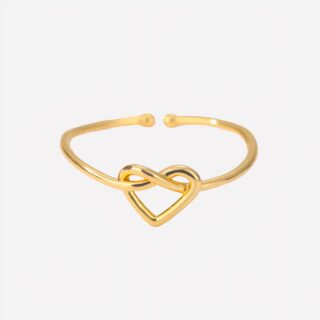 Bague dorée minimaliste forme de coeur noué