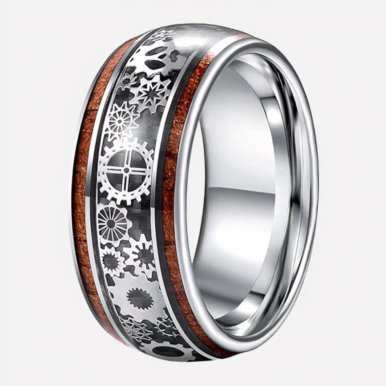 Bague homme moderne en tungstène et bois Photo d'une bague homme moderne en tungstène et bois avec des rouages de montres tout autour sur un fond blanc