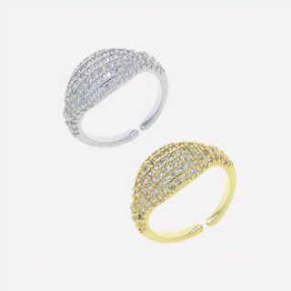 Photo de deux bagues ouvertes femme pour auriculaire l'une dorée l'autre argentée ornées de zirconiums sur un fond blanc